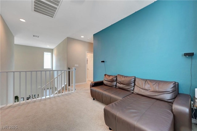 6334 Orions Belt Peak St, North Las Vegas, NV 89031 - carpeted living room with recessed lighting and baseboards