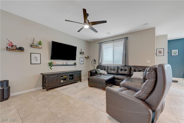 6334 Orions Belt Peak St, North Las Vegas, NV 89031 - living area featuring a ceiling fan, light tile patterned flooring, and baseboards