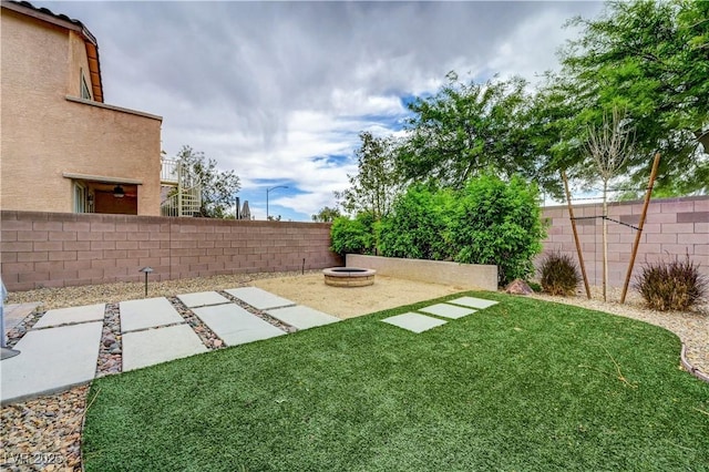 6334 Orions Belt Peak St, North Las Vegas, NV 89031 - view of yard with a patio and an outdoor fire pit