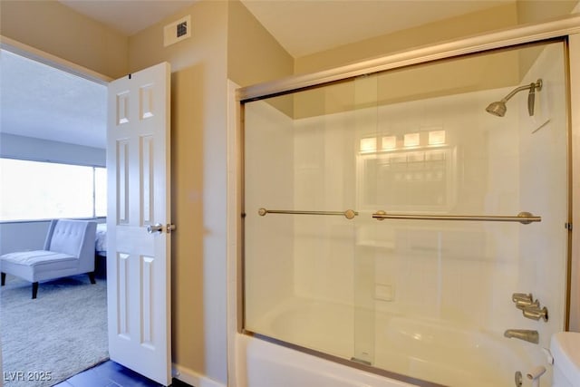 745 N Royal Crest Cir Unit 127, Las Vegas, NV 89169 - bathroom with bath / shower combo with glass door