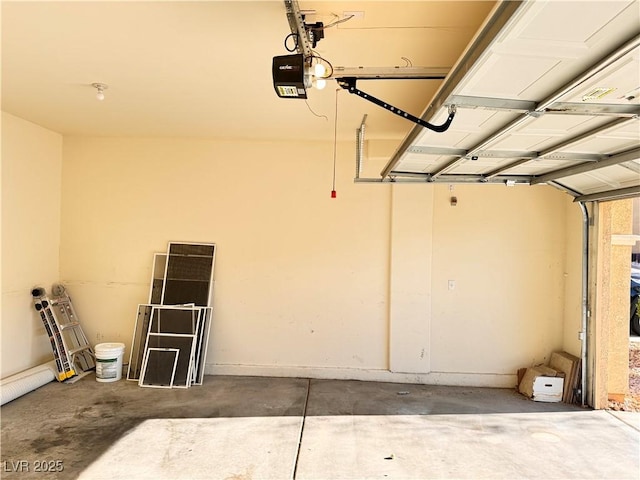 5653 Mount Athos St, North Las Vegas, NV 89031 - garage featuring a garage door opener