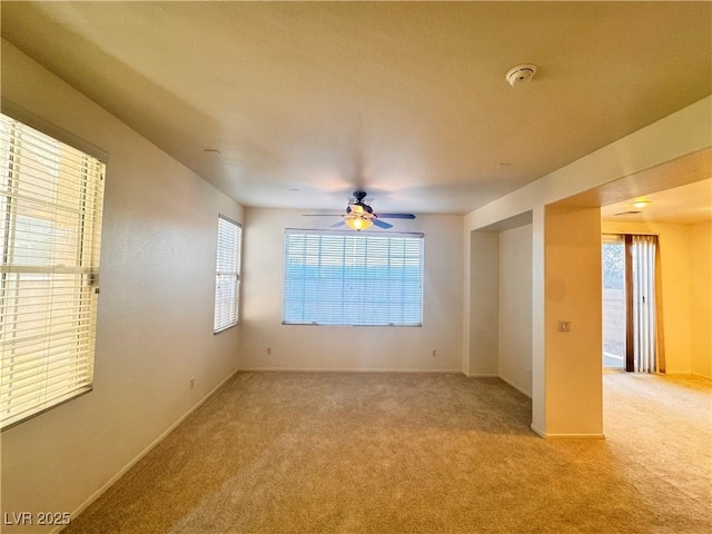 5653 Mount Athos St, North Las Vegas, NV 89031 - empty room featuring carpet, a smoke detector, ceiling fan, and baseboards