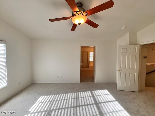 5653 Mount Athos St, North Las Vegas, NV 89031 - unfurnished bedroom featuring carpet floors, multiple windows, and ceiling fan