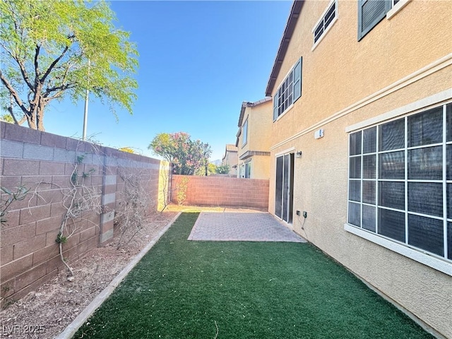 5653 Mount Athos St, North Las Vegas, NV 89031 - view of yard with a patio