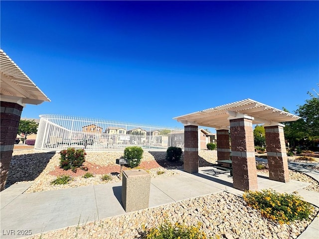 5653 Mount Athos St, North Las Vegas, NV 89031 - view of home's community with a pergola