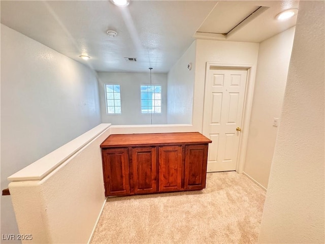 5653 Mount Athos St, North Las Vegas, NV 89031 - hall with light colored carpet and baseboards