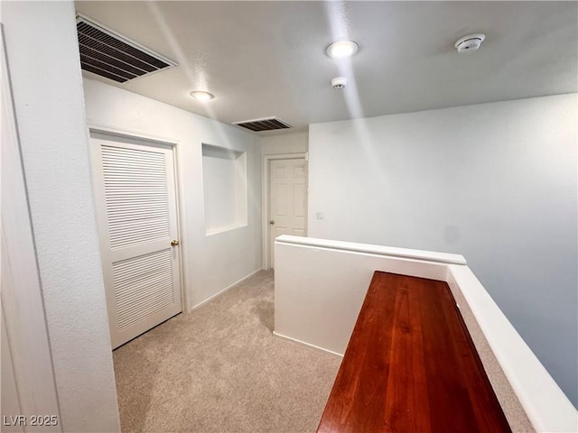 5653 Mount Athos St, North Las Vegas, NV 89031 - corridor with light colored carpet