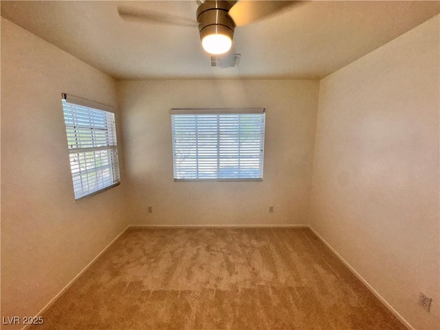 5653 Mount Athos St, North Las Vegas, NV 89031 - carpeted empty room with a ceiling fan and baseboards