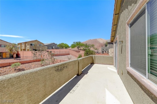 5079 Quiet Falls Ct, Las Vegas, NV 89141 - view of patio with a residential view and a balcony