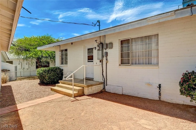 557 6th St, Boulder City, NV 89005 - entrance to property featuring a patio area and concrete block siding
