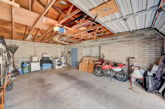 557 6th St, Boulder City, NV 89005 - garage featuring washer / clothes dryer and a garage door opener