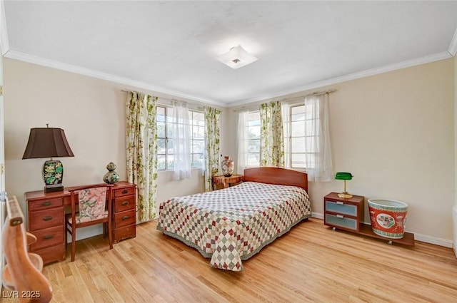 557 6th St, Boulder City, NV 89005 - bedroom with wood finished floors, crown molding, and baseboards