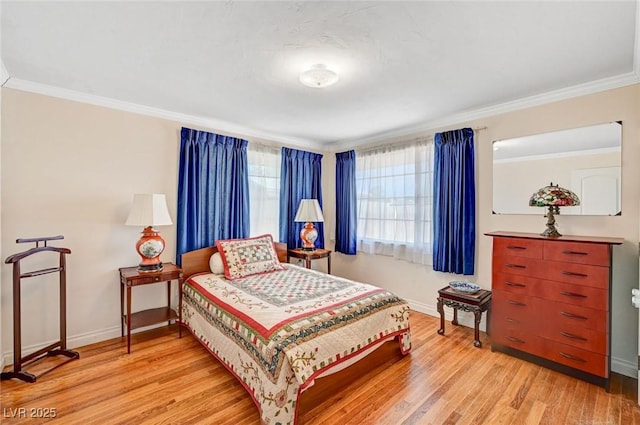 557 6th St, Boulder City, NV 89005 - bedroom with wood finished floors, ornamental molding, and baseboards