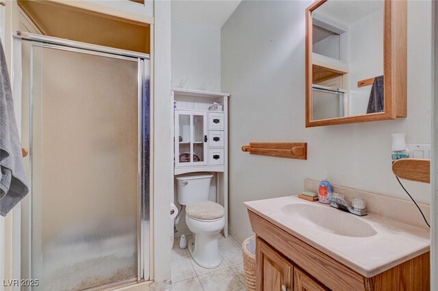 557 6th St, Boulder City, NV 89005 - bathroom with a stall shower, vanity, and toilet