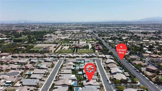 7072 Arabian Ridge St, Las Vegas, NV 89131 - aerial overview of property's location with a mountainous background