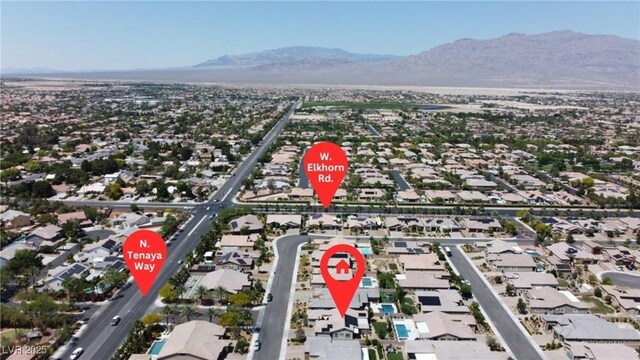 7072 Arabian Ridge St, Las Vegas, NV 89131 - aerial overview of property's location featuring mountains and nearby suburban area