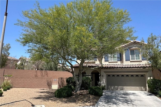 8682 Gateway Glen Dr, Las Vegas, NV 89178 - view of front facade with stucco siding, a tile roof, an attached garage, and concrete driveway