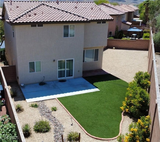 8682 Gateway Glen Dr, Las Vegas, NV 89178 - rear view of property with stucco siding, a tile roof, and a patio