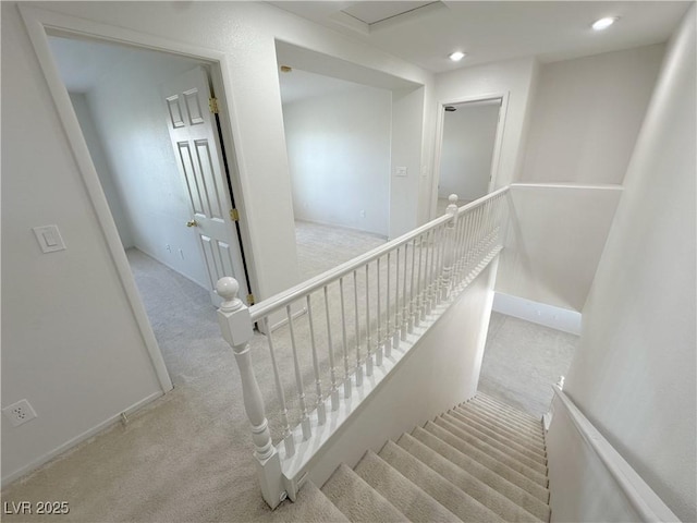 8682 Gateway Glen Dr, Las Vegas, NV 89178 - stairway featuring carpet, recessed lighting, and baseboards