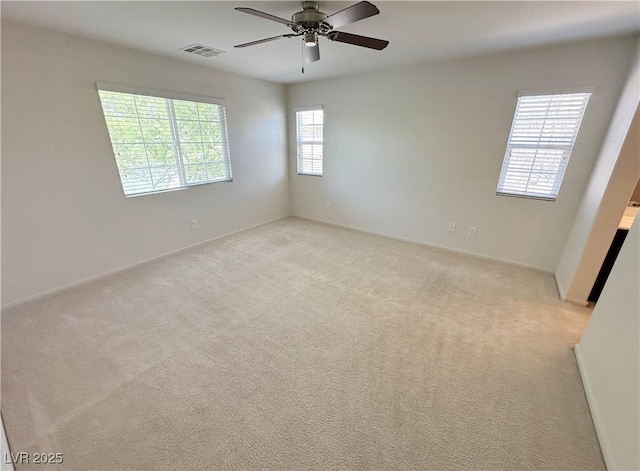 8682 Gateway Glen Dr, Las Vegas, NV 89178 - unfurnished room with ceiling fan, light colored carpet, and baseboards