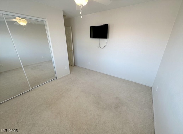 8682 Gateway Glen Dr, Las Vegas, NV 89178 - unfurnished bedroom featuring carpet, a closet, and a ceiling fan