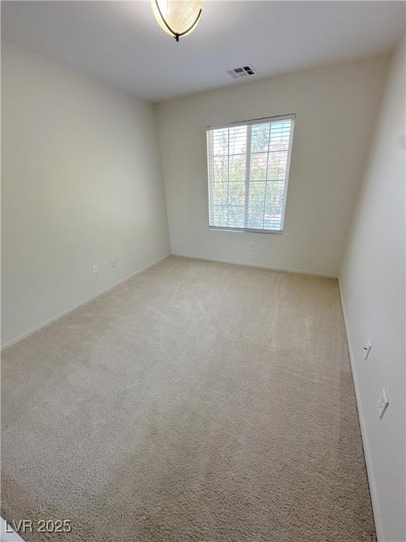 8682 Gateway Glen Dr, Las Vegas, NV 89178 - spare room featuring carpet