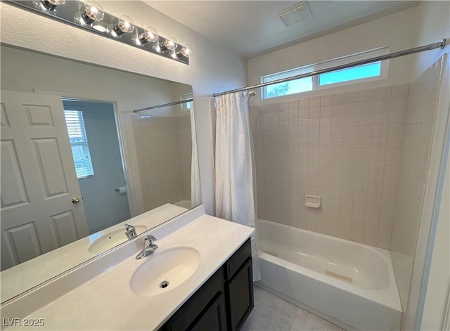 8682 Gateway Glen Dr, Las Vegas, NV 89178 - bathroom with vanity, shower / bath combination with curtain, and tile patterned flooring