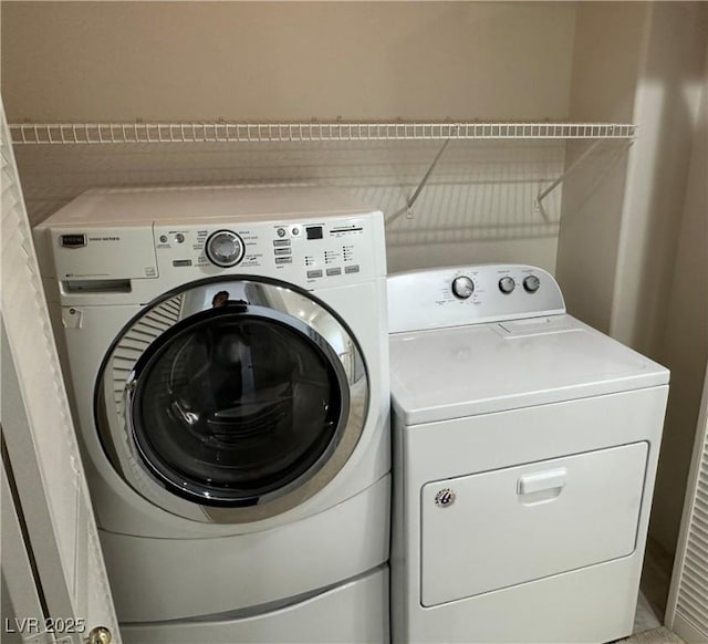 8682 Gateway Glen Dr, Las Vegas, NV 89178 - laundry area with washing machine and clothes dryer