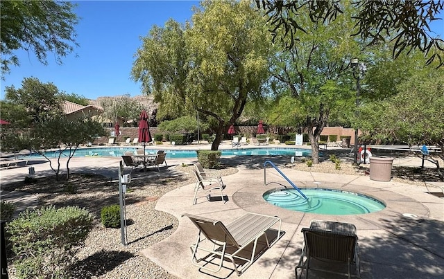 8682 Gateway Glen Dr, Las Vegas, NV 89178 - community pool with a hot tub and a patio