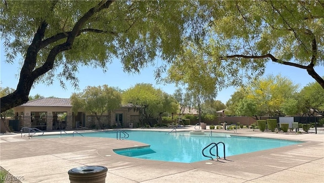 8682 Gateway Glen Dr, Las Vegas, NV 89178 - community pool featuring a patio