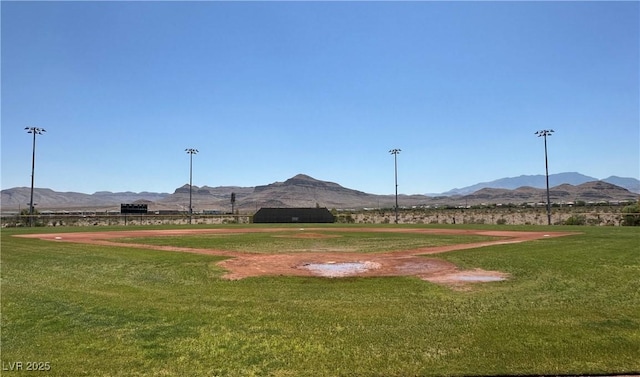 8682 Gateway Glen Dr, Las Vegas, NV 89178 - view of home's community with a mountain view and a lawn