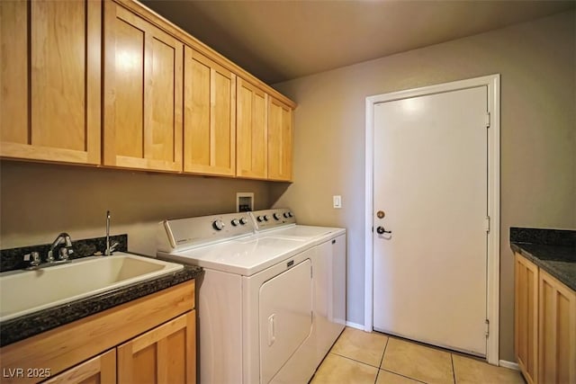 1740 Flores Ln, Henderson, NV 89012 - laundry area featuring cabinet space, separate washer and dryer, and light tile patterned floors