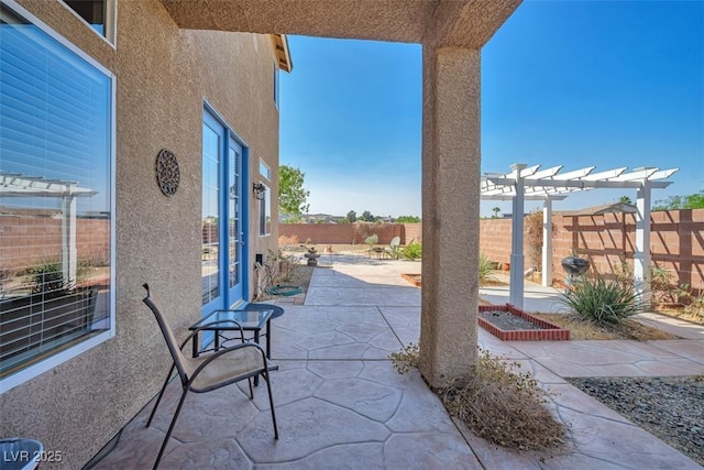1740 Flores Ln, Henderson, NV 89012 - fenced backyard with a pergola and a patio