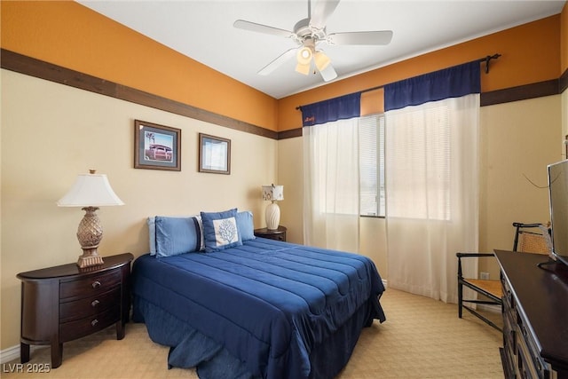 5747 Jaborandi Ave, Pahrump, NV 89061 - bedroom with light carpet and a ceiling fan