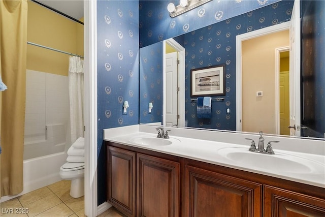 5747 Jaborandi Ave, Pahrump, NV 89061 - full bath with toilet, wallpapered walls, tile patterned flooring, double vanity, and shower / tub combo with curtain