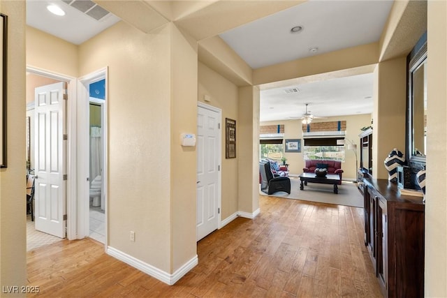 5747 Jaborandi Ave, Pahrump, NV 89061 - corridor with hardwood / wood-style floors, baseboards, and recessed lighting