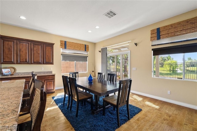 5747 Jaborandi Ave, Pahrump, NV 89061 - dining room with light wood-type flooring, baseboards, and recessed lighting