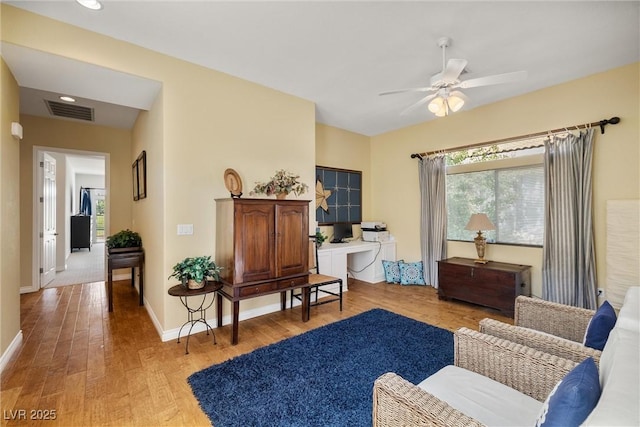 5747 Jaborandi Ave, Pahrump, NV 89061 - living area with light wood-style floors, a ceiling fan, baseboards, a desk, and recessed lighting