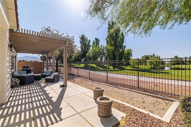 5747 Jaborandi Ave, Pahrump, NV 89061 - fenced backyard featuring an outdoor hangout area and a patio area