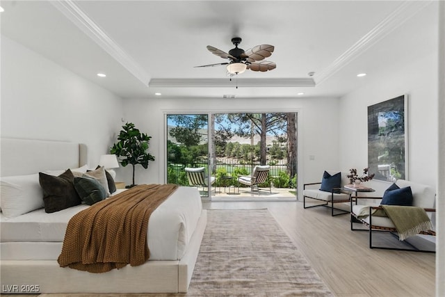 11775 Woodbrook Ct, Las Vegas, NV 89141 - bedroom with access to exterior, a tray ceiling, crown molding, light wood-type flooring, and recessed lighting