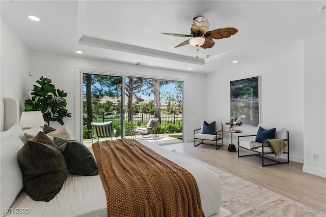 11775 Woodbrook Ct, Las Vegas, NV 89141 - bedroom featuring a tray ceiling, access to exterior, recessed lighting, light wood-type flooring, and baseboards