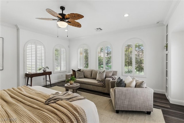 11775 Woodbrook Ct, Las Vegas, NV 89141 - living room featuring plenty of natural light, crown molding, wood finished floors, recessed lighting, and baseboards