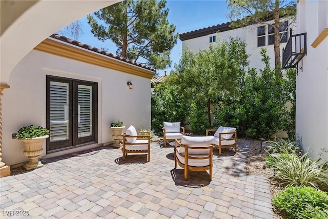 11775 Woodbrook Ct, Las Vegas, NV 89141 - view of patio / terrace featuring french doors