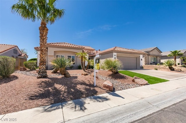 9425 Villa Ridge Dr, Las Vegas, NV 89134 - mediterranean / spanish-style home featuring stucco siding, a tiled roof, a garage, and driveway