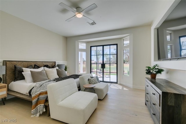 9425 Villa Ridge Dr, Las Vegas, NV 89134 - bedroom featuring access to outside, light wood-type flooring, baseboards, and a ceiling fan
