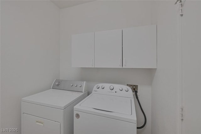 829 Dancing Vines Ave, Las Vegas, NV 89183 - laundry area featuring cabinet space and independent washer and dryer