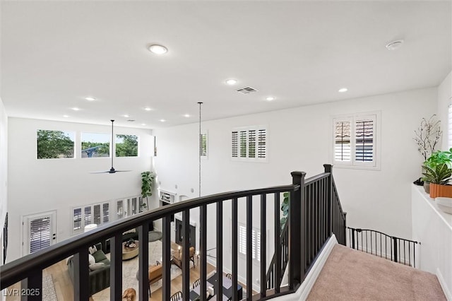 11340 Espadrille Ct, Las Vegas, NV 89138 - hallway with an upstairs landing, plenty of natural light, and recessed lighting
