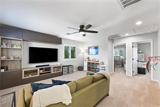 11340 Espadrille Ct, Las Vegas, NV 89138 - living area featuring light colored carpet, attic access, a ceiling fan, recessed lighting, and baseboards