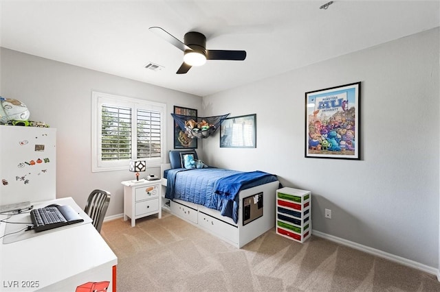 11340 Espadrille Ct, Las Vegas, NV 89138 - bedroom with light colored carpet, ceiling fan, baseboards, and a desk