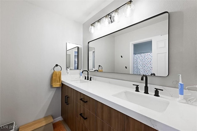 11340 Espadrille Ct, Las Vegas, NV 89138 - full bath featuring double vanity and baseboards
